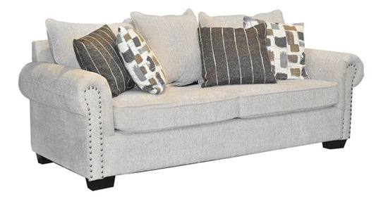 SOFA CASEY 3 CUERPOS, TAPIZ TELA COLOR BEIGE CON COJINES VOLANTES DE COLOR                       2.35*0.95*0.90                                                 0.97 M3